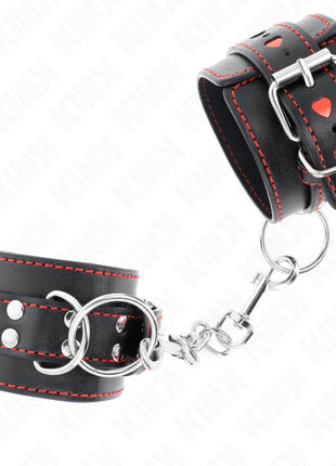 KINK - SCHWARZE HANDGELENKFESSELN MIT ROTER HERZEINLAGE VERSTELLBAR 21-28 CM X 5,5 CM