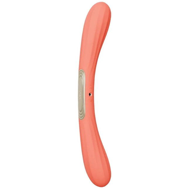 Coralfarbener lelo boomerang doppelender vibrator mit glattem silikon und silbernem bedienfeld
