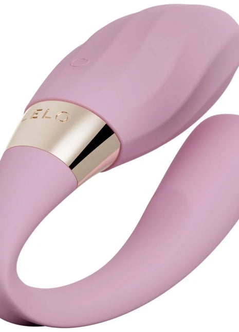 Pink silikon paarvibrator mit goldfarbenem metallband und der eingravierten marke elo von LELO TIANI TWIST