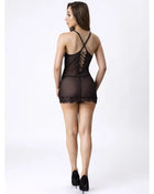 Schwarzer transparenter spitzenbodysuit von livco corsetti mit gekreuzten trägern am rücken und feiner spitzensaum