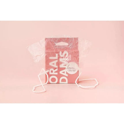 Rosa rechteckige loovara oral dams box aus latexfreiem material mit weißem text und zwei weißen elastikbändern als physische barriere