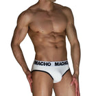 Weisse macho briefs mit schwarzem rand und hochwertigem anpassungsfähigen lycra-gewebe für maximalen komfort