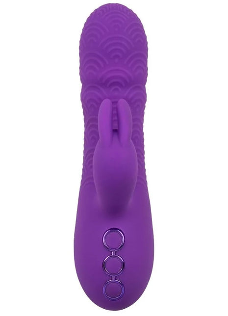 Lila silikon vibrator in form eines kaninchens mit wellenstruktur und drei runden bedientasten von manhattan beach marvel