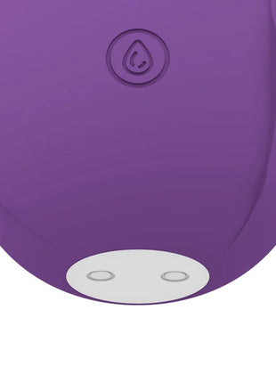 Violettes silikonspielzeug mia rose air wave stimulator limited edition mit wassertropfenemblem und zwei kreisförmigen eindellungen am boden