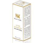 Weiße rechteckige box mit goldener beschriftung und rand von nina kiki intimi womanfly stimulierungsspray