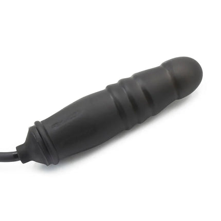 Schwarzes silikon-vibrationsspielzeug mit strukturierten rillen und kabel im produkt ohmama aufblasbarer fetischdildo