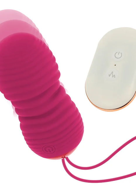 Fuchsia silikon vibratorei mit 7 modi und rosegold akzent fernbedienung von OHMAMA für angenehme stimulation