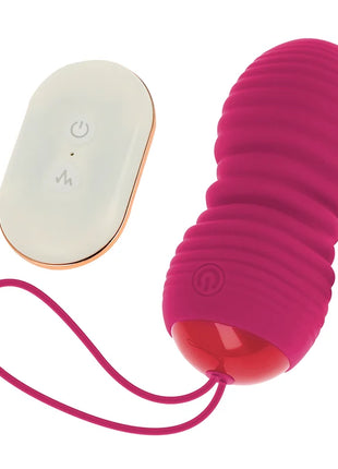 Fuchsia silikon ei vibrator mit 7 modi und fernbedienung in weiß mit rosegold trimmen