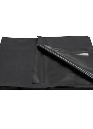 Schwarzes wasserdichtes pvc einweg-blatt von ohmama fetish mit glänzender leicht reflektierender oberfläche