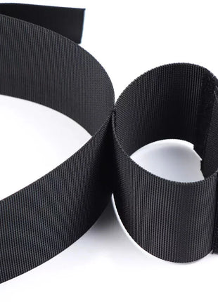 Schwarzer elastischer handgelenk- und taillenhalter mit klettverschluss von ohmama fetish