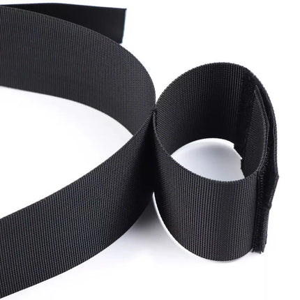 Schwarzer elastischer handgelenk- und taillenhalter mit klettverschluss von ohmama fetish