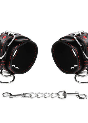 Ohmama fetish handschellen mit herzeinlagen aus schwarzem leder mit roter naht und silberner kette