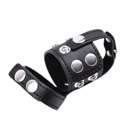 Schwarzes leder-armband mit silbernen metallnieten und druckknöpfen ohmama fetish keuschheitshülle
