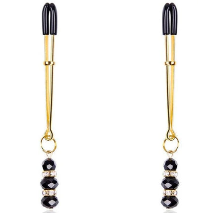Schwarze und goldene ohmama fetish nippelklemmens mit facettierten schwarzen perlen und klaren kristallen