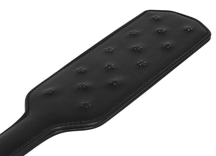Ohmama fetish tack paddel schwarzes fauxleder mit glatter glänzender oberfläche und gleichmäßig genopften vertiefungen