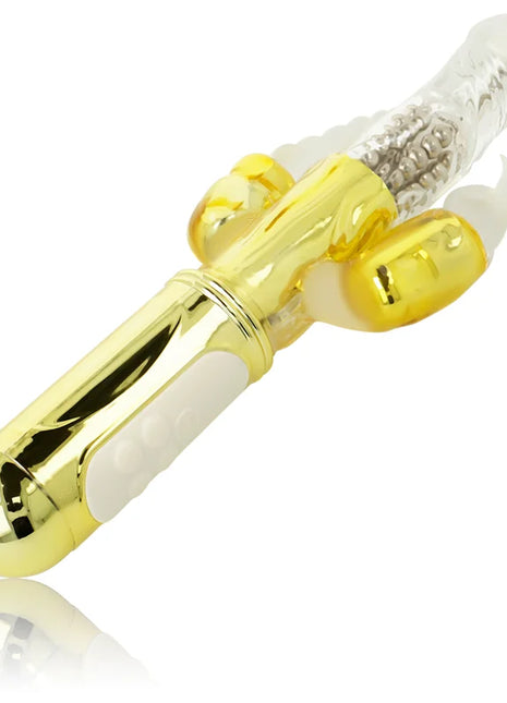 Goldener multifunktionsvibrator ohmama mit transparentem kopf und gelben akzenten in sleekem design