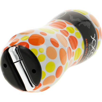 Ein weißer ohmama masturbator mit anusvibration, orange-gelben punkten und schwarz-chrom kappe