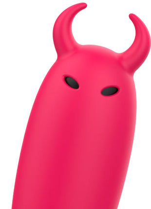 Ein lebhaft pinkfarbener ohmama pocket devil vibrator stimulator mit glatter oberfläche und zwei gebogenen hörnern