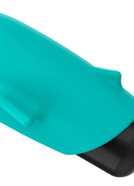 Ohmama pocket dolphin vibrator xmas edition in teal silicone with a black base designed for discreet pleasure