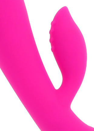 Vibranter pinker silikonvibrator ohmama mit glatter, geschwungener form und strukturiertem griffbereich 19 cm