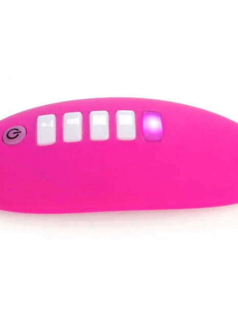 Vibrant pink silicone ohmibod lightshow-lichtstimulator with five white buttons and glowing purple light on the right side