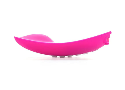 Vibrant pink silicone spatula with smooth curved design and rounded edges from ohmibod lightshow-lichtstimulator mit fernbedienung