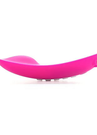 Vibrant pink silicone spatula with smooth curved design and rounded edges from ohmibod lightshow-lichtstimulator mit fernbedienung