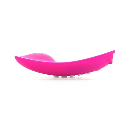 Vibrant pink silicone spatula with smooth curved design and rounded edges from ohmibod lightshow-lichtstimulator mit fernbedienung