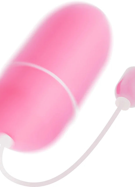 Rosa wasserdichtes vibrations-ei aus silikon mit weißem kabel und pinker spitze für angenehme anwendung