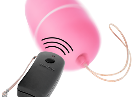 Online vibrierendes ei mit rosa silikon und schwarzer fernbedienung mit an aus schalter und silbernem schlüsselanhänger