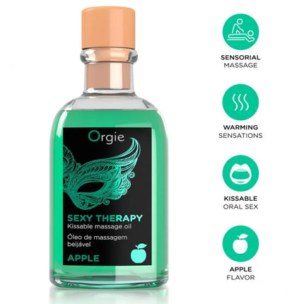 Eine klare glasflasche mit pfirsichfarbenem deckel enthält grünes apfelduftendes sexy therapy kussmassageöl im lippenmassage-set