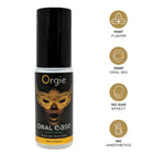 Schwarze und goldene sprayflasche orgie oral ease mund und rachenspray minze 50 ml mit dekorativer goldmaske