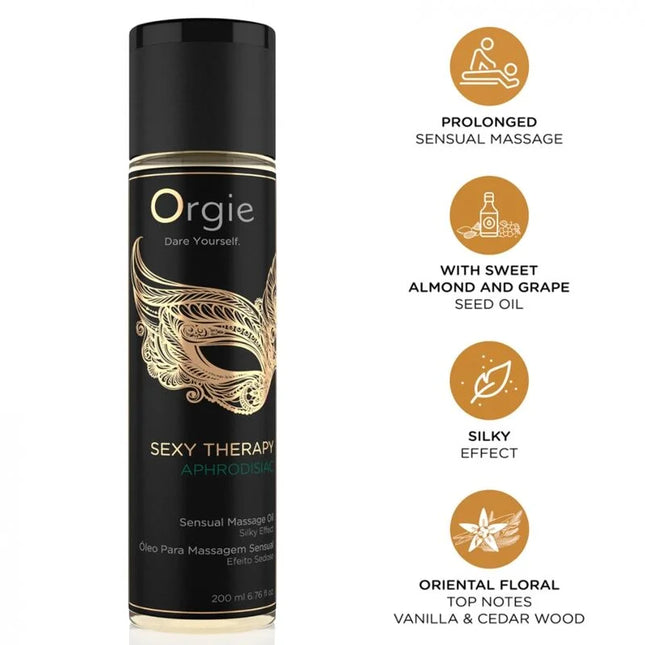 Schwarze zylinderförmige flasche orgie sexy therapy aphrodisiac massageöl mit goldfolie und dekorativer maskenoptik für sinnliche massagen