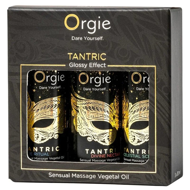 Orgie tantrische mini-kollektion sinnlichen massageölen in schwarzer und goldener verpackung mit himmlischem duft