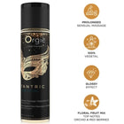 Schwarze spraydose orgie tantric essential mit goldfolie und maskendesign pflanzliches körperöl für sinnliche massagen