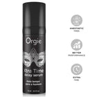 Schwarze zylindrische flasche orgie xtra time delay serum mit silberner verzierung und weißem text 15 ml