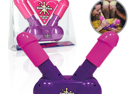 Dual pump action penis spiel in lila und pink mit verspieltem cartoon design für cum face party spiel