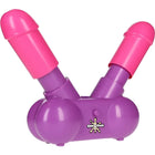 Lila und pinkes plastikspielzeug cumo face mit zwei zylindrischen enden aus der play wiv me cum face party spiel serie