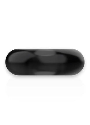 Ein sleek schwarzer kapsel-förmiger pillenbehälter für powering super flexibler und widerstandsfähiger penisring 3,5 cm
