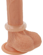Peachfarbener silikon dildo mit transparentem glänzendem ring und strukturiertem griff für super flexiblen penisring