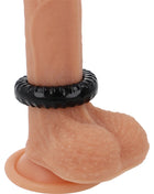 Schwarzer powering super flexibler und widerstandsfähiger penisring 4,5 cm aus texturiertem material an silikon dildo
