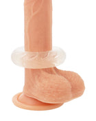 Peachfarbener silikon dildo mit klarem, strukturiertem ring um den schaft und rundem basisring powering super flexibler penisring 5cm pr08 klar