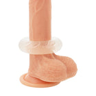 Peachfarbener silikon dildo mit klarem, strukturiertem ring um den schaft und rundem basisring powering super flexibler penisring 5cm pr08 klar