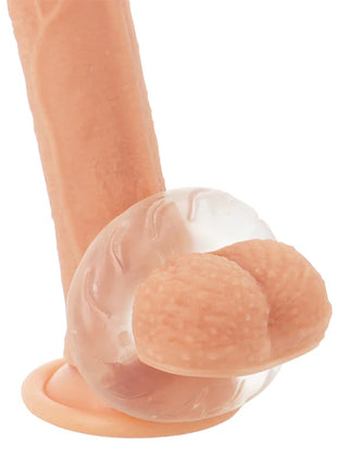 Peachfarbener silikon dildo mit transparentem, strukturiertem ständer und abgerundetem kopf powering super flexibler penisring 5cm klar