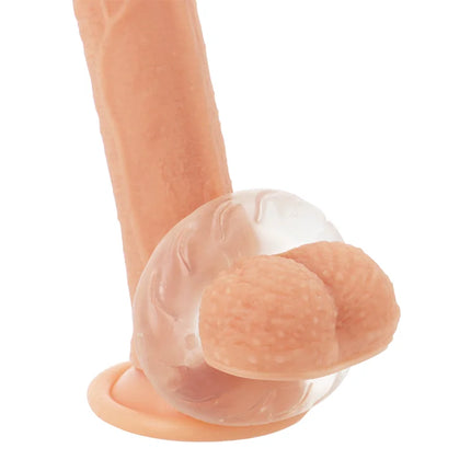 Peachfarbener silikon dildo mit transparentem, strukturiertem ständer und abgerundetem kopf powering super flexibler penisring 5cm klar