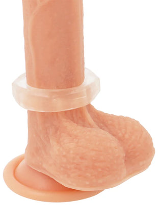 Peachfarbener silikon-dildo mit klarer facettierter 5 cm penisringbasis powering super flexibel und widerstandsfähig