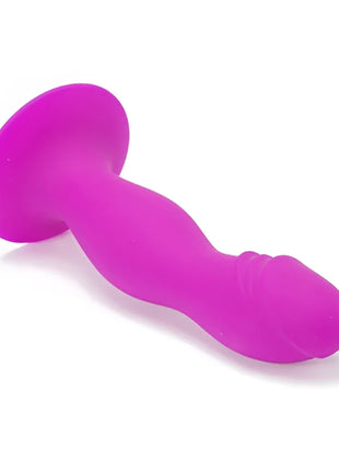 Ein vibrierender pinker, wellenförmiger silikon-analplug mit abgerundetem boden und spitz zulaufender spitze von pretty love