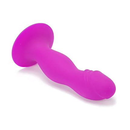 Ein vibrierender pinker, wellenförmiger silikon-analplug mit abgerundetem boden und spitz zulaufender spitze von pretty love