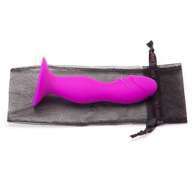 Vibranter pinker silikon analplug mit breitem sockel in schwarzem netzaufbewahrungsbeutel von pretty love booty passion realistischer stecker