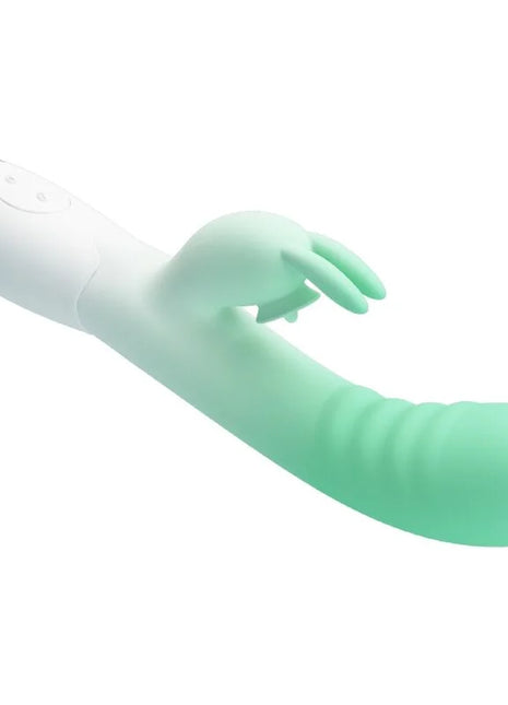 Mintgrüner und weißer silikon rabbit vibrator cerberus von pretty love mit lächelndem gesicht auf dem griff